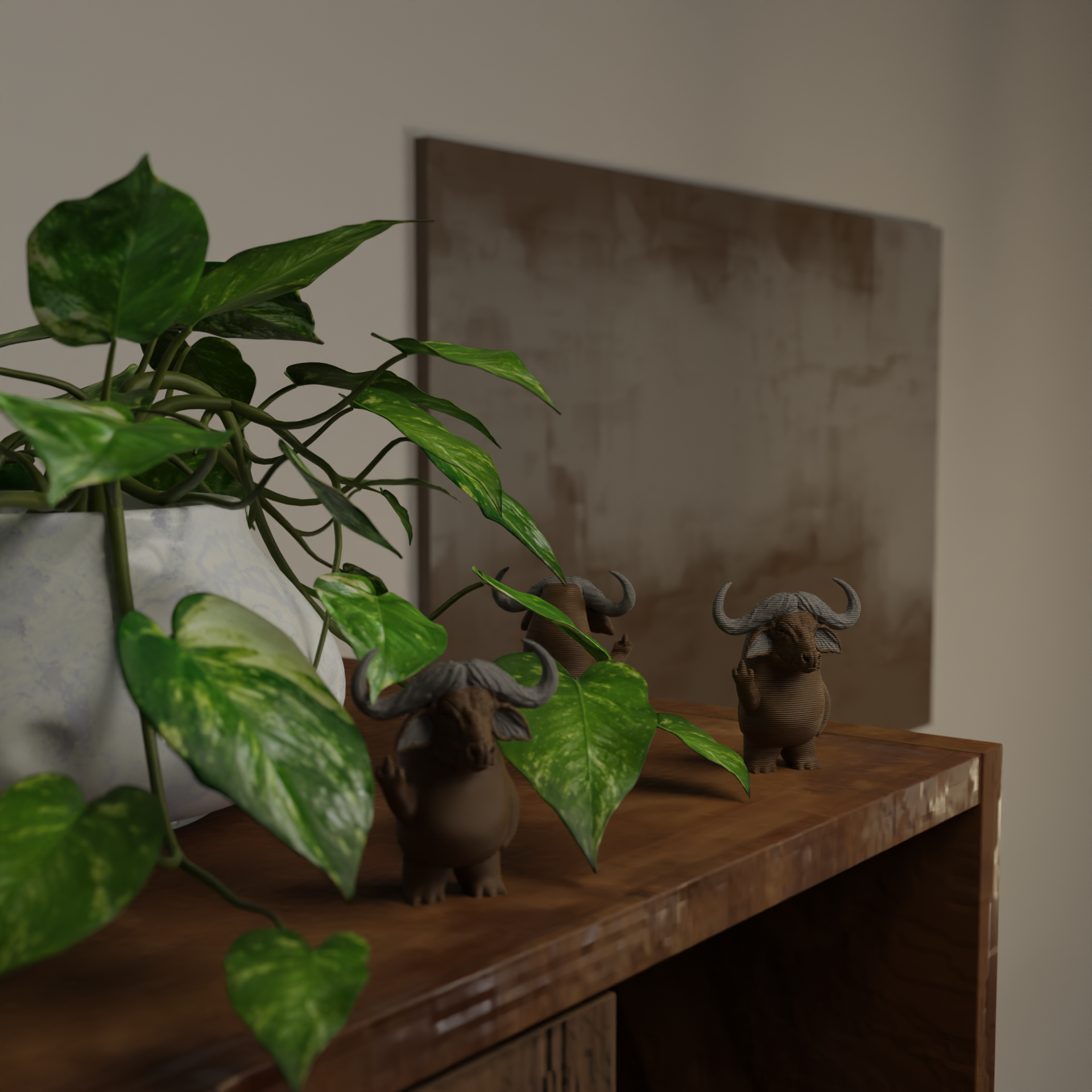 Small buffalo figurine next to a plant, funny miniature wild animal decoration and unique buffalo gift for home decor with greenery