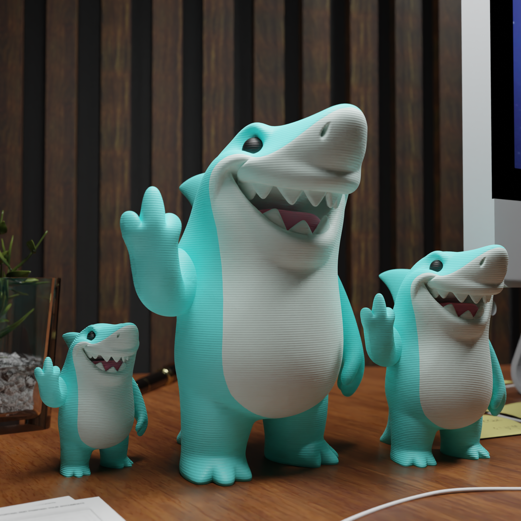 Small Great White Shark figurine placed next to a computer, miniature sea life decoration and funny shark gift for office desk workspace