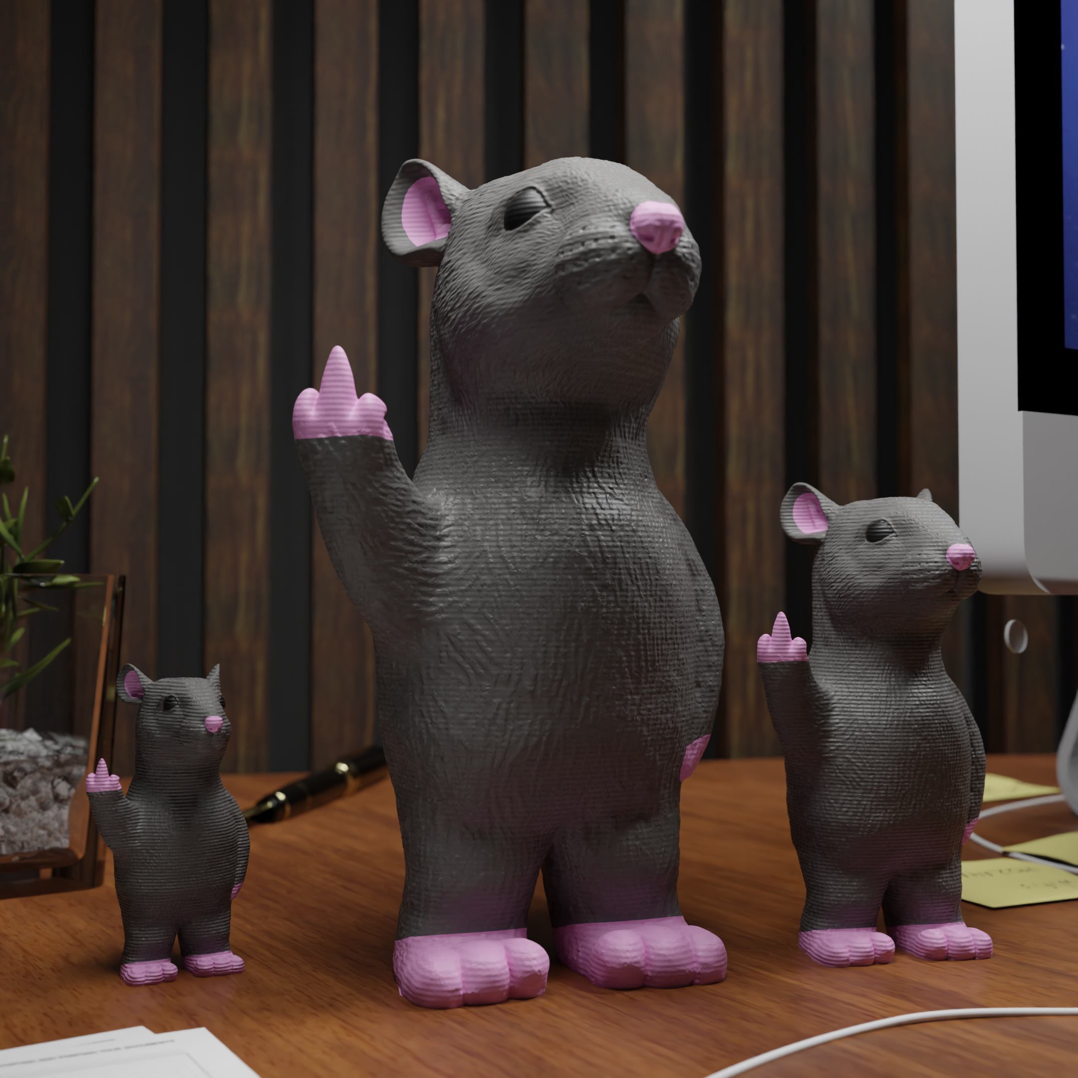 Small rat figurine placed next to a computer, miniature animal decoration and funny rat gift for office desk workspace