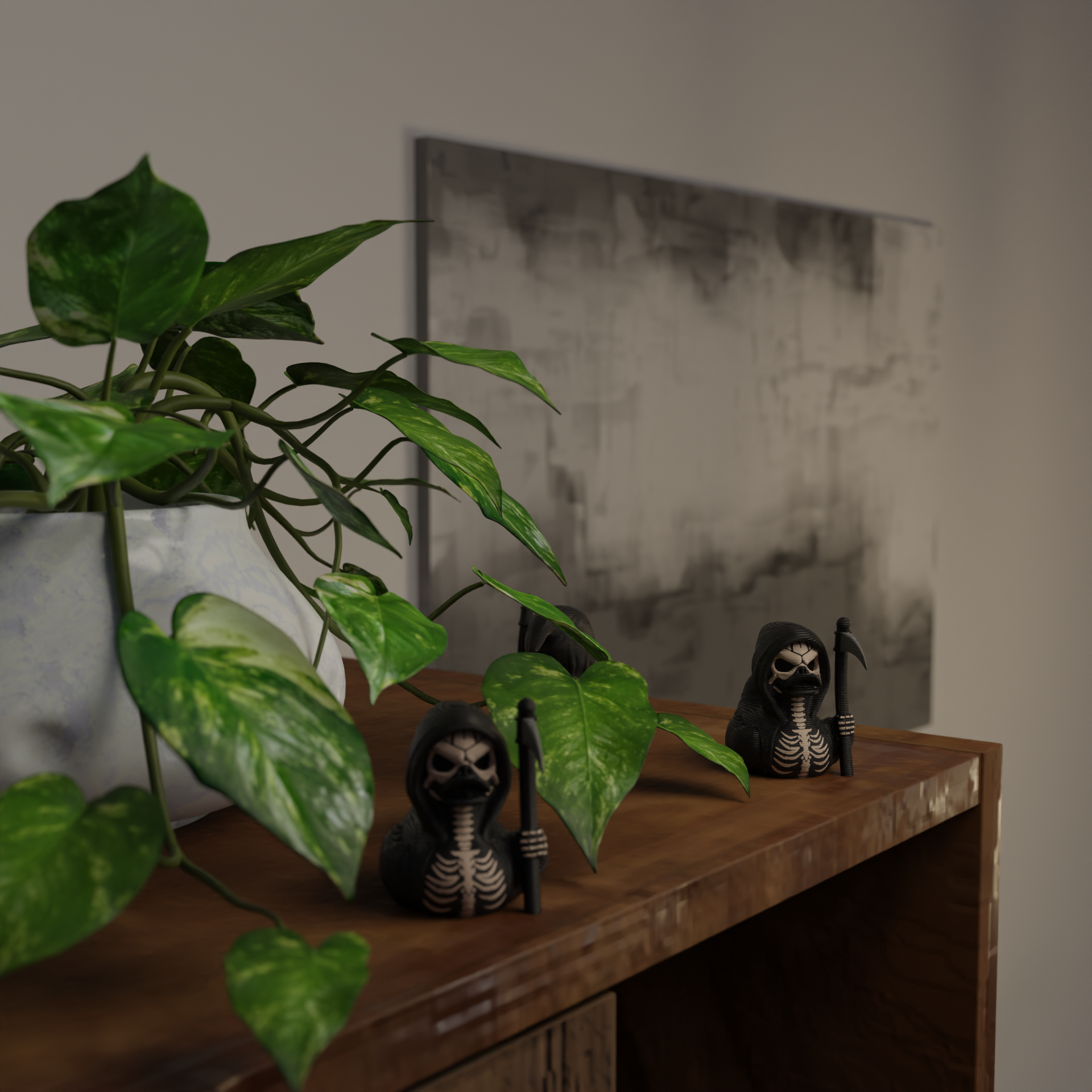 Small Reaper Duck figurine next to a plant, funny spooky miniature decoration and unique duck gift for home decor with greenery