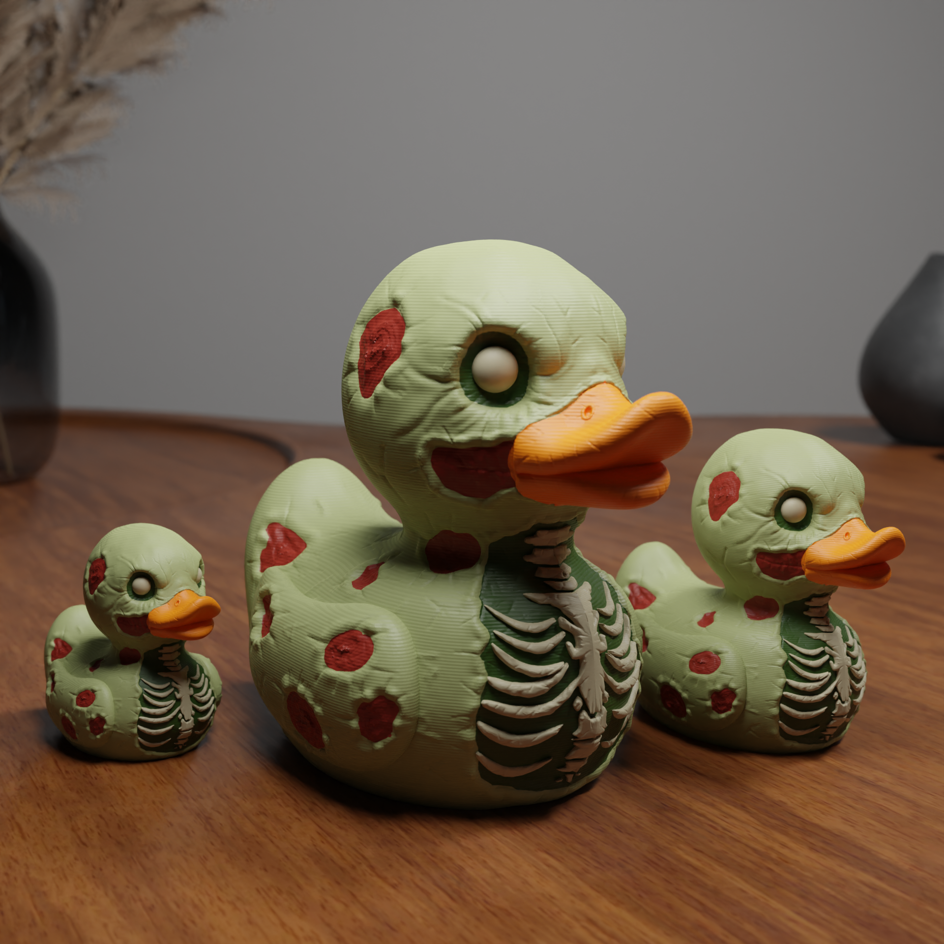 Small Zombie Duck figurine placed next to a computer, spooky miniature decoration and funny duck gift for office desk workspace