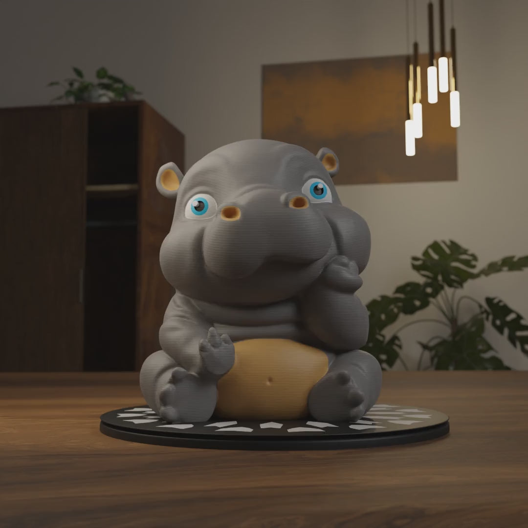 Small baby hippo figurine displayed on a shelf, funny miniature animal decoration for home interior display