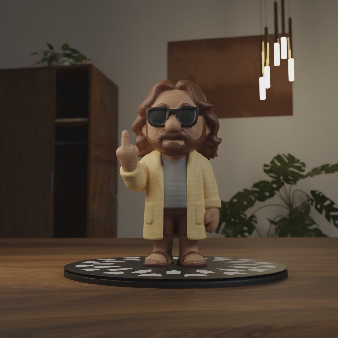 Small The Dude figurine on a coffee table, funny miniature character decoration and gift idea for movie fans and living room decor