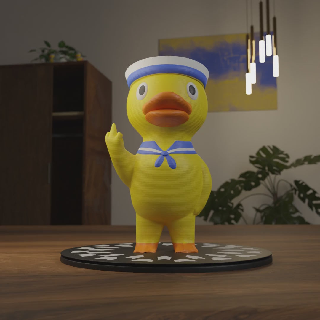 Small sailor duck figurine displayed on a shelf, cute nautical miniature animal decoration and funny sailor duck gift for home interior display