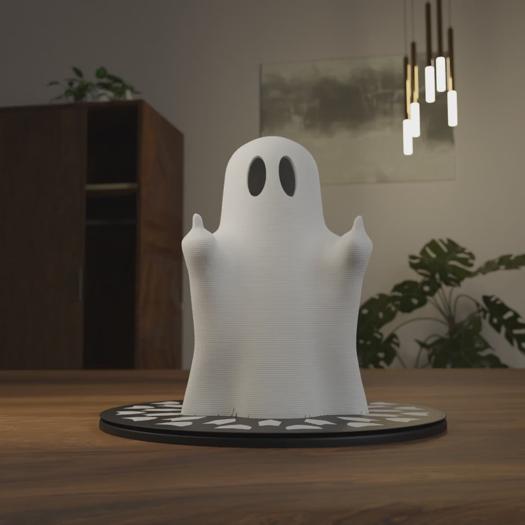 Small ghost figurine flipping the bird displayed on a closet, spooky miniature decoration and funny Halloween gift for home interior display