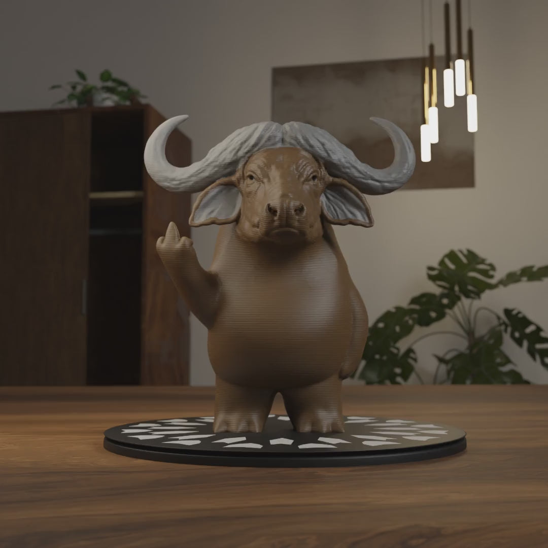 Small buffalo figurine on a desk, funny miniature wild animal decoration and unique buffalo gift for office or home workspace